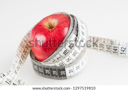 apple and tape measure - healthy life