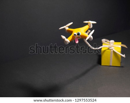 The drone Close up. Cartoon drone with the parcel. with a box