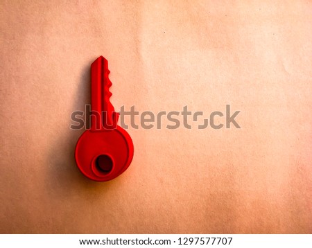 Red key on a wooden Retro tones . concept and idea means symbolic for Unlocking the Secrets to Success .