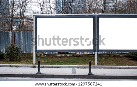 billboard mockup outdoors, exterior templates advertising poster at day time with street light line for advertisement street signboard . With clipping path on screen