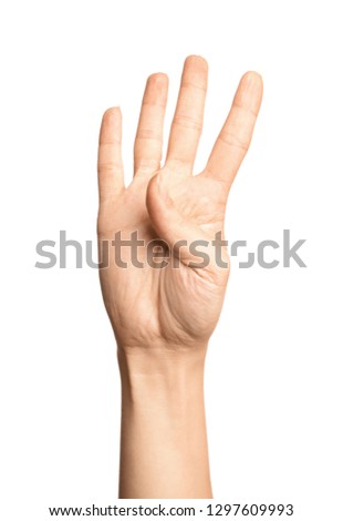 Woman showing number four on white background, closeup. Sign language