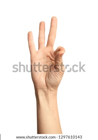 Woman showing number nine on white background, closeup. Sign language