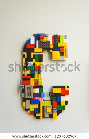 Picture of block letters hanging on children's bedroom wall.