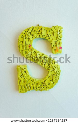 Picture of letters hanging on children's bedroom wall.