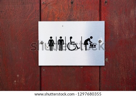 Disabled and baby change male female toilet sign