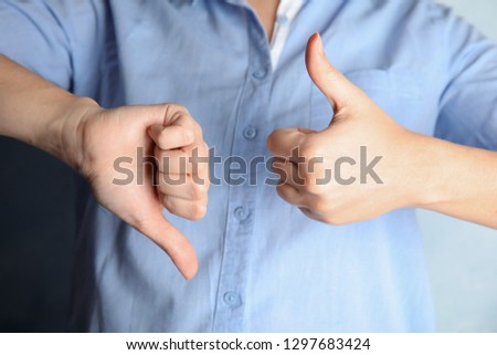 Woman showing hand sign, closeup. Body language