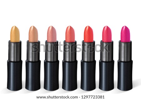 Group of colorful lipstick on white background.