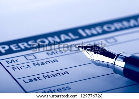 Filling Document Form - Paperwork, office, business Royalty-Free Stock Photo #129776726