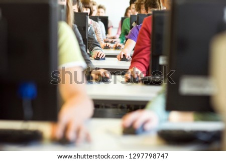 Detail of high school students at computers