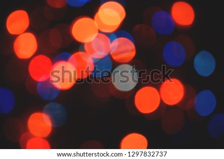 Colorful lights bokeh background, Chrismas lights bokeh. Colorful abstract background. Blurred and glowing lights. Boceh lens effect from lighting spots.