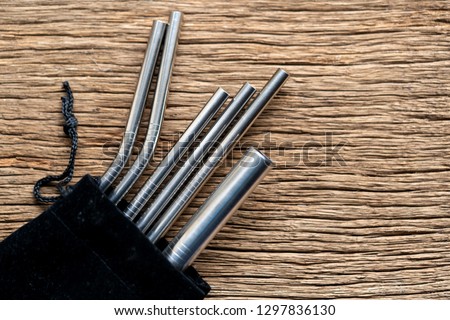 Stainless steel straws for reusable and reduce the use of plastic straw. Reduce plastic waste in environment. Royalty-Free Stock Photo #1297836130