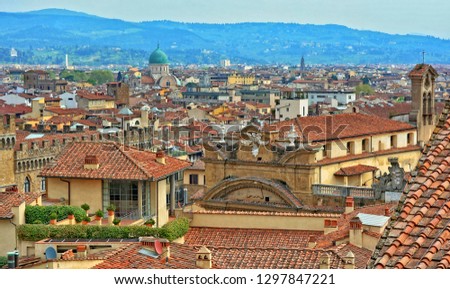 Aerial view. Nice buildings in the old city with hills in the background. Panoramic skyline. Urban landscape. Italy, Florence 