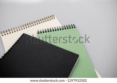  Flat lay blog mock-up. Top view of open spiral blank notebook
