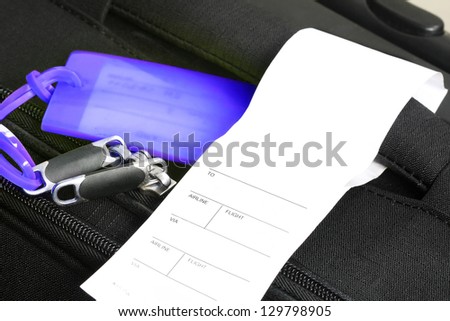Traveling suitcase with checkin label (manual focus)