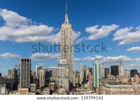 View over the empire state building from a roof top in New York City, USA Royalty-Free Stock Photo #129799142