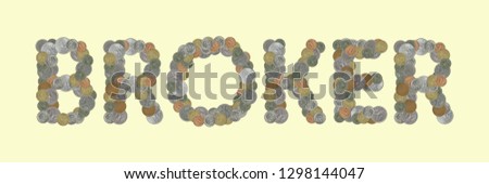 BROKER – Coins on yellow background