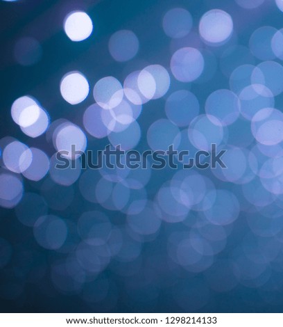 Blue bokeh of lanterns for christmas as a background .