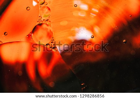 colorful background from water drops and oil