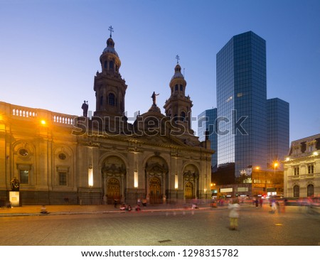 General view on Plaza de Armas in Santiago in evening with city lights