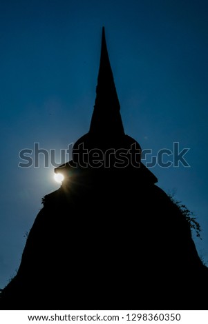 silhouette of the pagoda at sunset, digital photo picture as a background