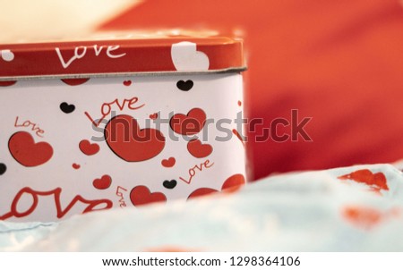 Valentine day composition: white gift boxes with bow and red felt hearts, photo template, background. Top View. View from above.