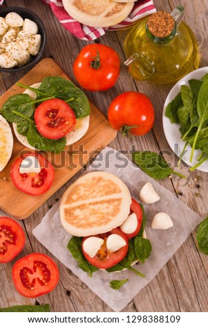 Tigella bread with spinach and tomatoes.