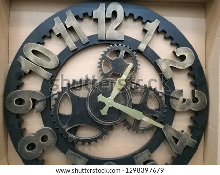 close up view gear of old bronze clock. Grunge gear, cog wheels background.
