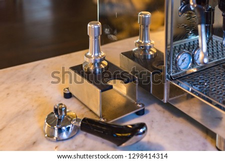 details of a italian coffee machine at a bar in south germany