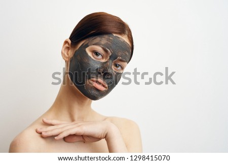 woman in a clay mask care portrait