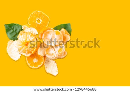 Slices of tangerine or orange. Fruit background. Flat lay, isolated on color background. Food background. Top view