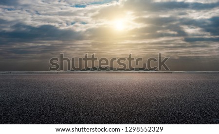 Asphalt road and sky clouds background 
