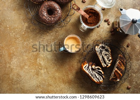 Delicious Breakfast with pastries, donuts and coffee. Top view. Food background with copy space.