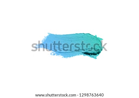 Smear and texture of lipstick or acrylic paint isolated on white background. Stroke of lipgloss or liquid nail polish swatch smudge sample. Element for beauty cosmetic design. Turquoise blue color