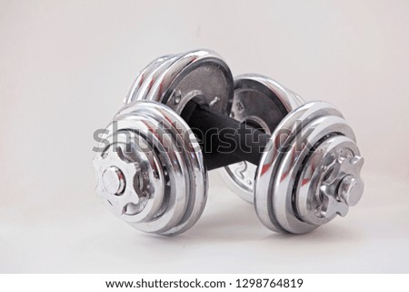 Fitness exercise equipment dumbbell weights on white background. dumbbells isolated