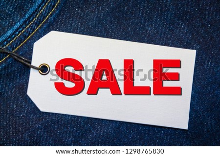White Sale Tag On Red