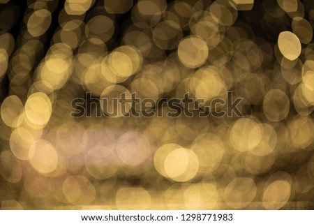 yellow bokeh light blurred city background