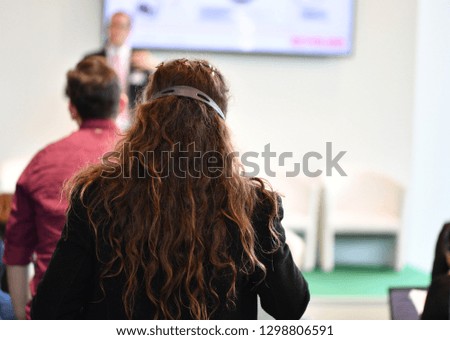 A young businesswoman attends a training event.