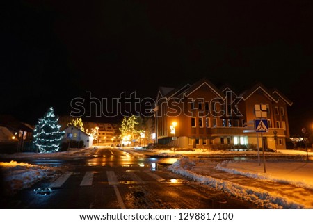 Nida City in Lithuania, in the period of Christmas, decorated with bright garlands