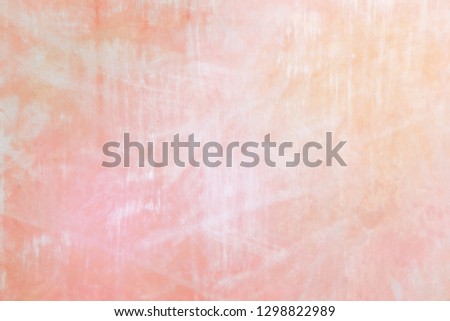 Light pink background with soft gradient and texture of paint strokes.