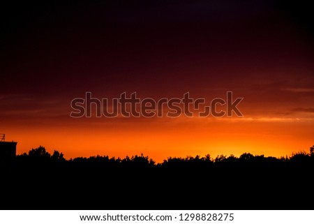 beautiful orange summer sky with clouds during sunset
