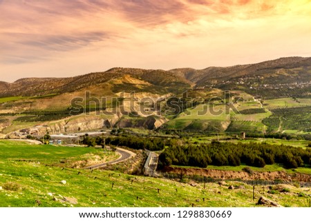 Israel countryside. Green valley in Golan Heights in Israel. Royalty-Free Stock Photo #1298830669