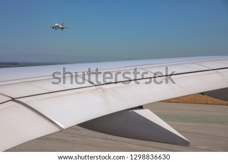 Wing of an airplane waiting to take off. Photo applied to tourism operators. picture for add text message or frame website. Traveling concept