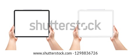 Woman holding tablet with blank screen. 