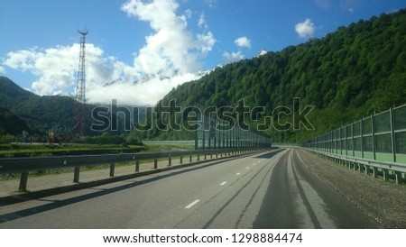 
road leading through the mountains