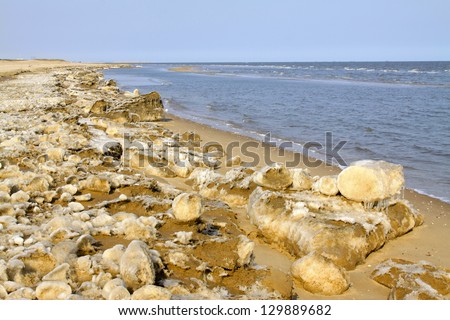 frozen sandy beach natural scenery in a geological park, north china