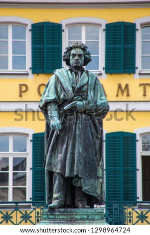 A statue of Ludwig Van Beethoven pictured infront of a former city palace - now the main post office, in the historic city of Bonn in Germany.  Beethoven was born in Bonn.