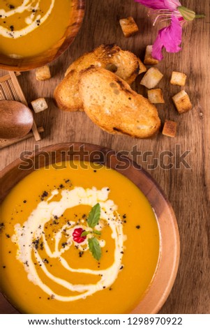 Pumpkin soup is one of the best fall soups you’ll ever taste. It is a diet food for those who want to lose weight. And is a vegetarian favorite. Present this picture as close up shot.
