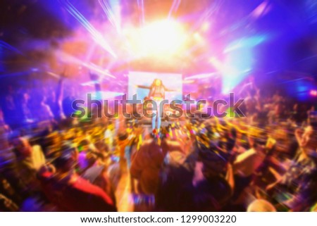 Silhouette Blurry night club DJ party people enjoy of music dancing sound.Abstract Background.Nightlife and disco concept.