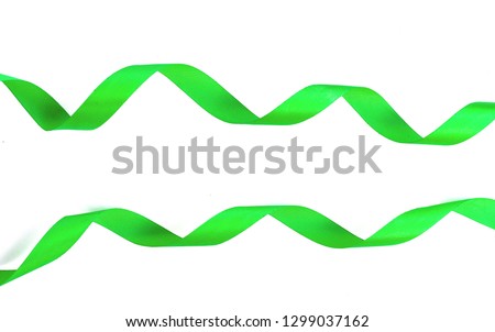 Green bow ribbon satin curly on white isolate background with clipping path concept for Christmas decoration gift  element, Easter day greeting card, wedding present wrap collection
