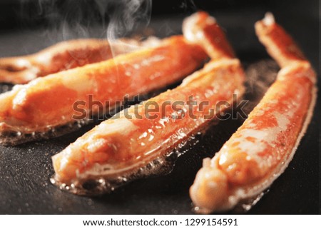 Baked snow crab legs image